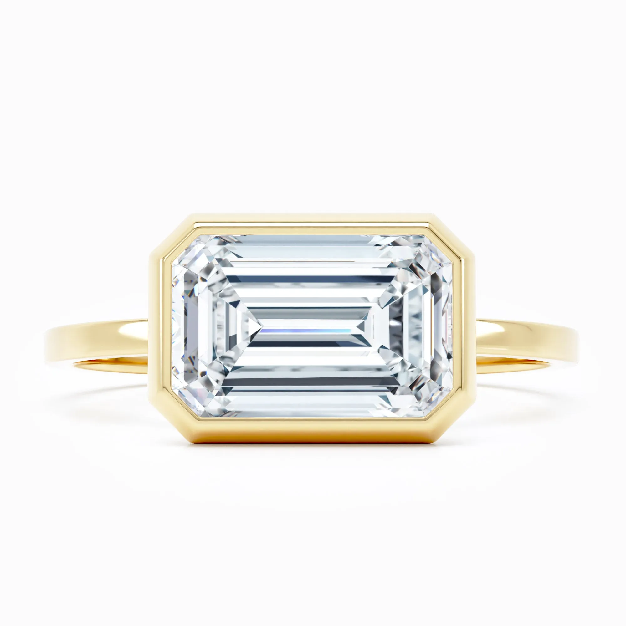 Bezel-Set East-West -  Emerald Cut Engagement Ring