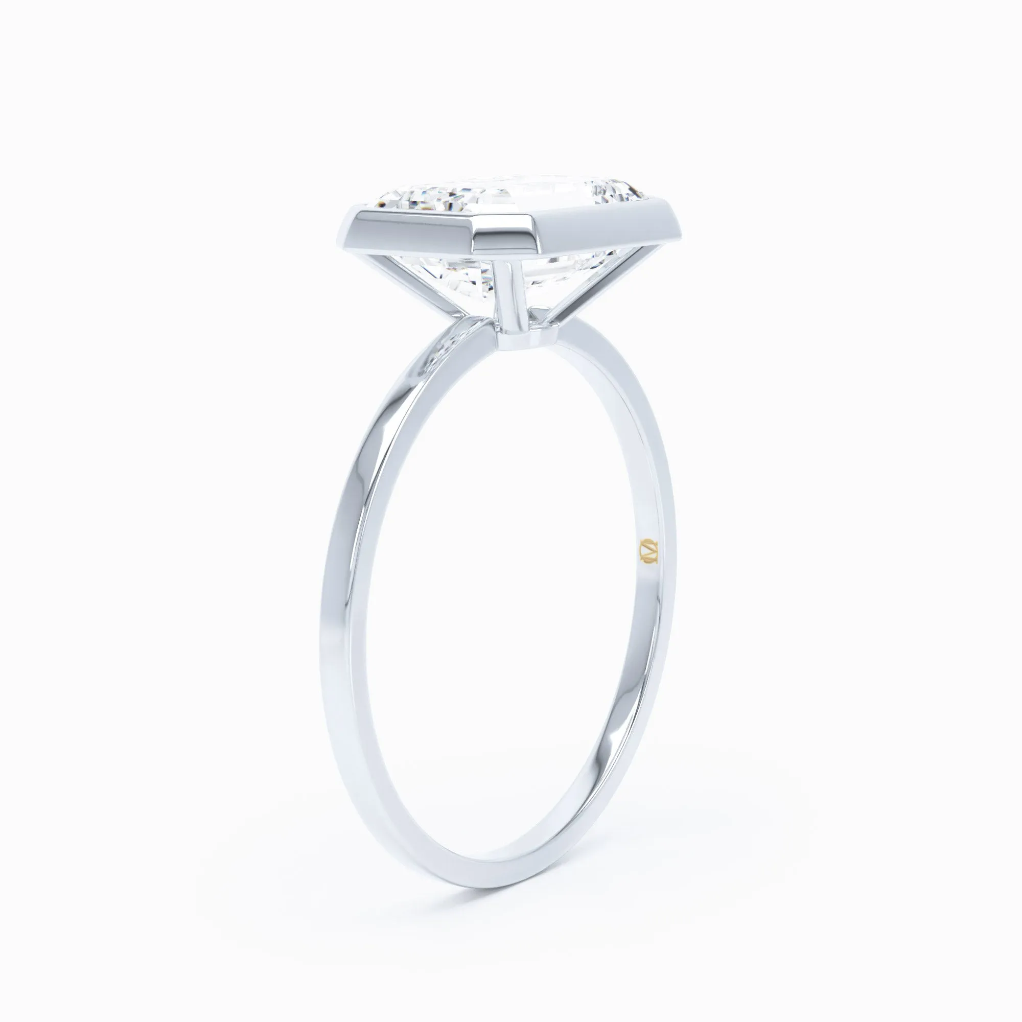 Bezel-Set East-West -  Emerald Cut Engagement Ring